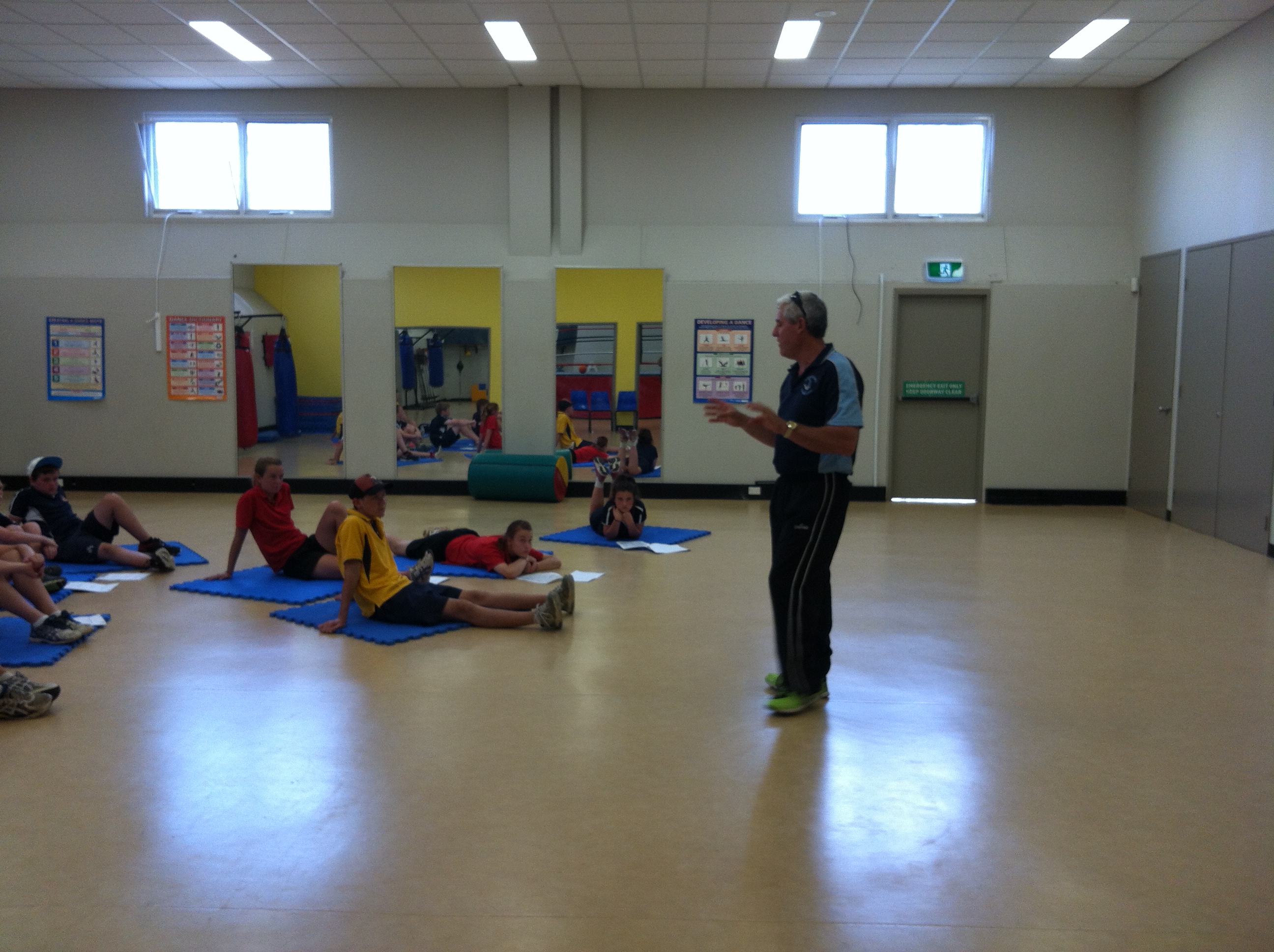 Girls learning in the gymnastics session